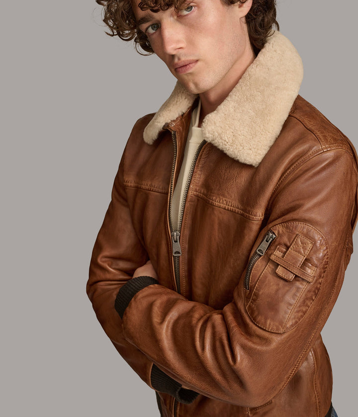 Closeup view of Ace Bomber Men leather jacket with open zipper 
