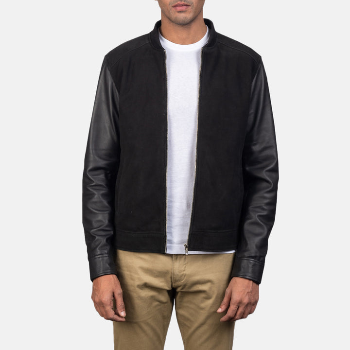 Front side view a man wearing a Blain Black Hybrid Bomber Jacket with a standing collar and zipper closure, paired with beige trousers and a white shirt.
