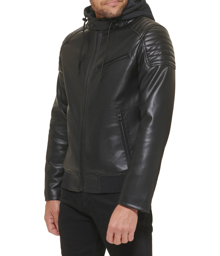 Right side view of a man wearing a Faux Leather Hooded Moto Jacket with a standing collar, zippered front, and hand pockets.